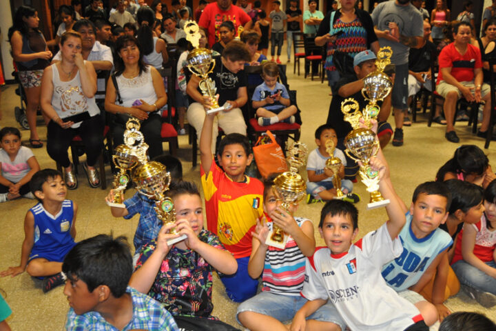 Children holding trophies